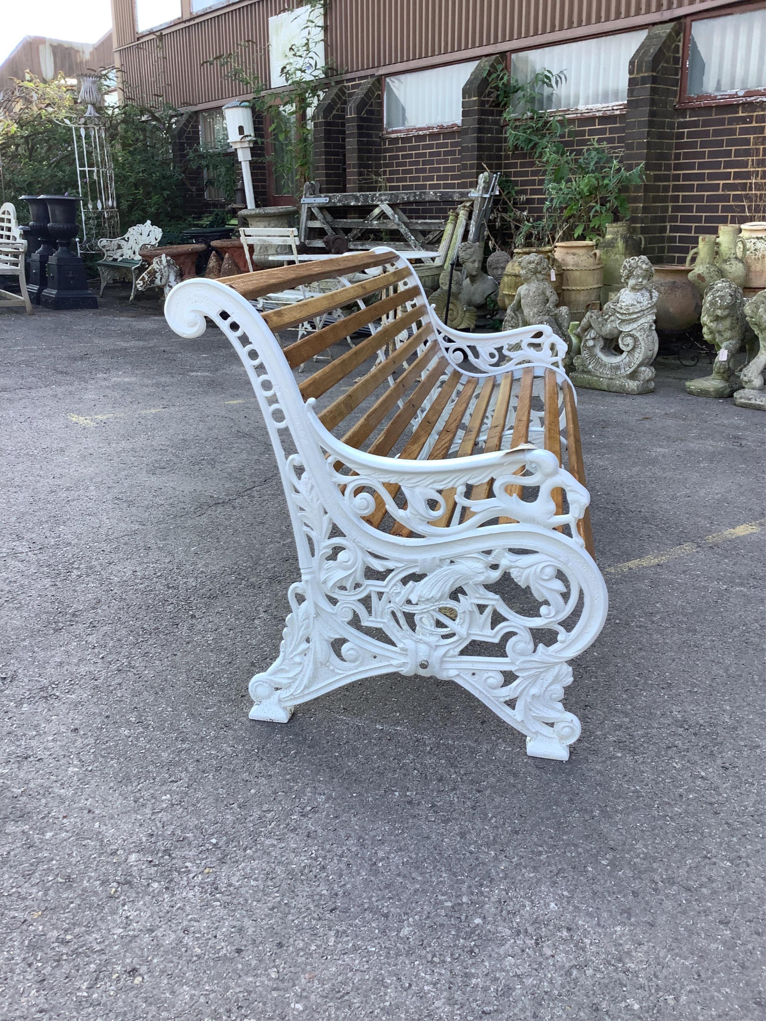 A Victorian style Coalbrookdale design cast iron garden bench (fully restored with varnished oak slats), width 178cm, depth 70cm, height 80cm. Condition - very good